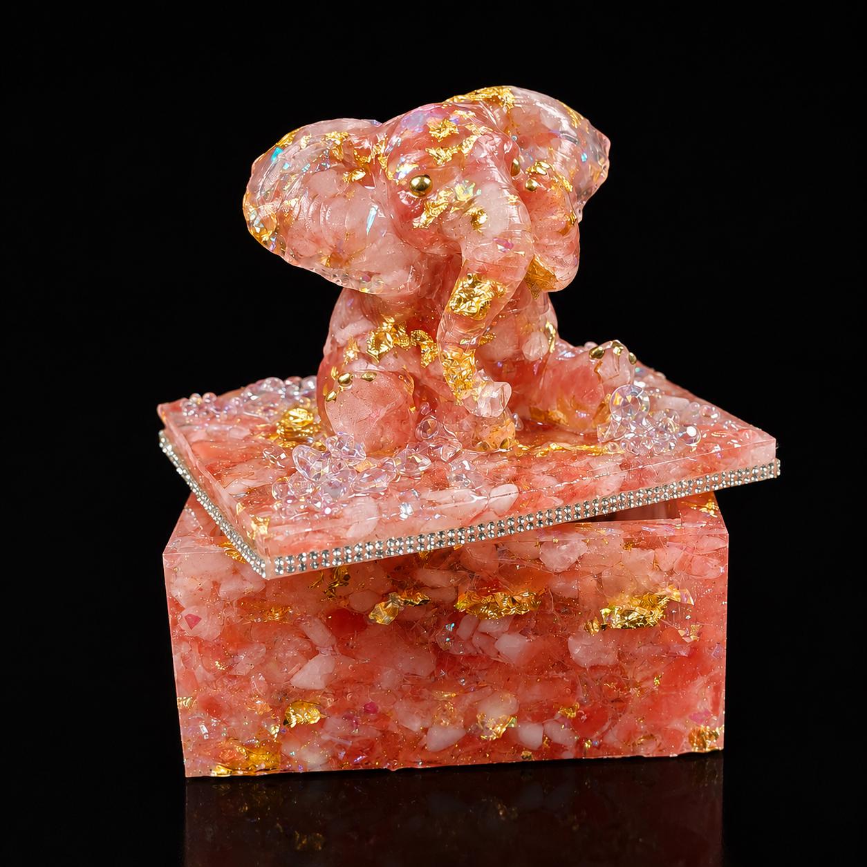 Overhead view of watermelon and rose quartz set into resin with gold leaf.